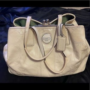 Coach cream color should bag, perfect for busy on the go purse lovers!